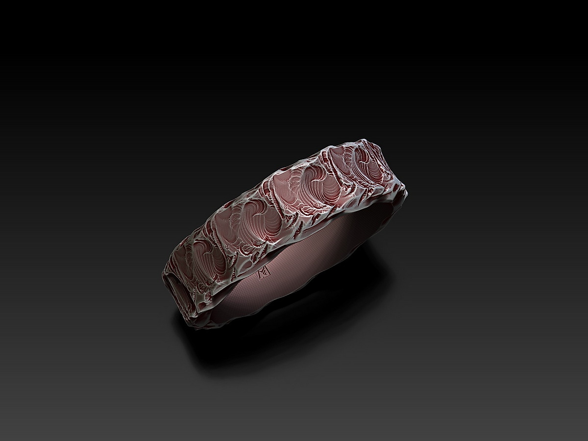 Angled view of Rock and Wave Ring showing the irregular wave-like surface across the upper exterior and smooth inner band